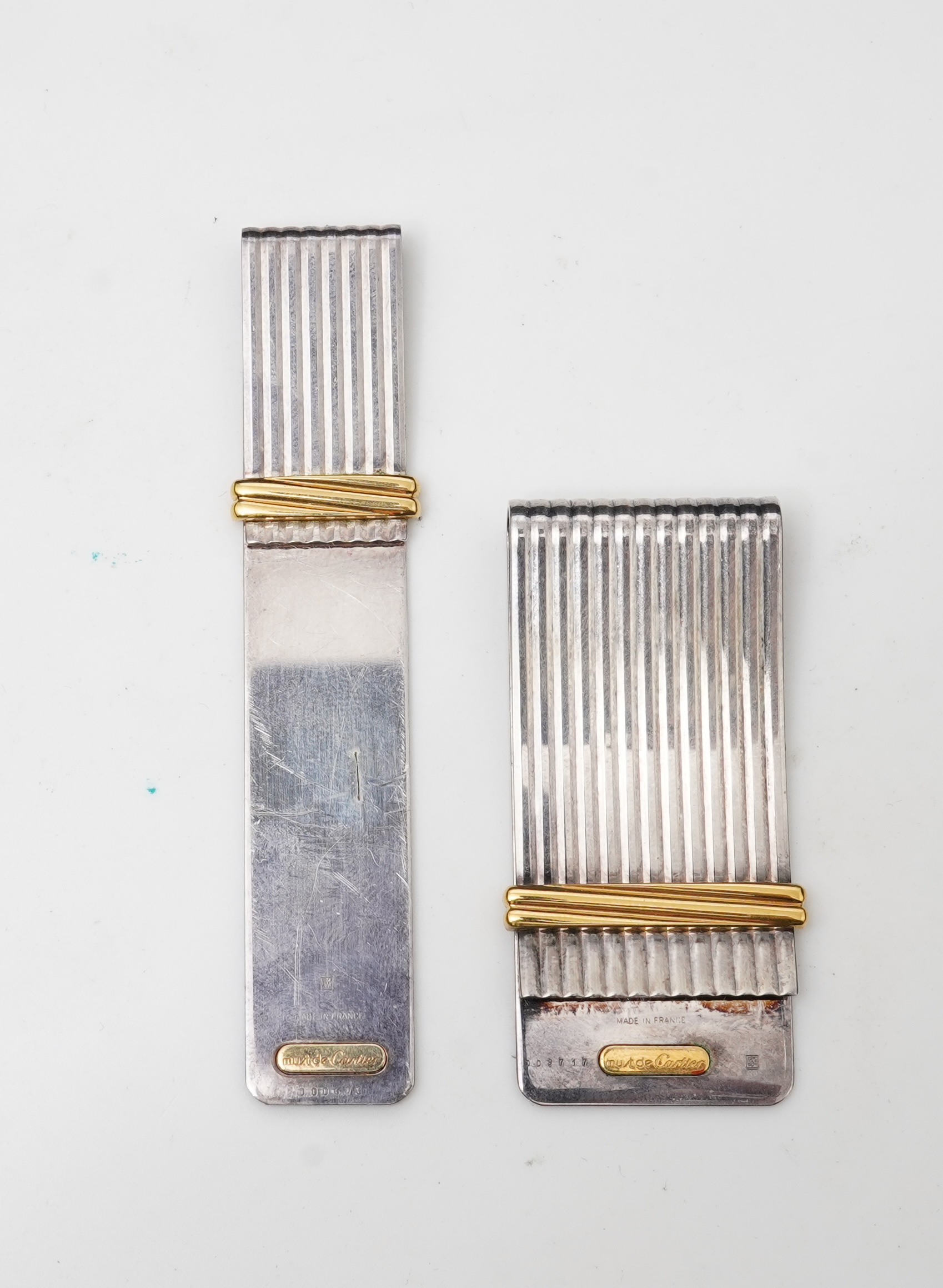 Cartier, two 'Must de Cartier' money clips